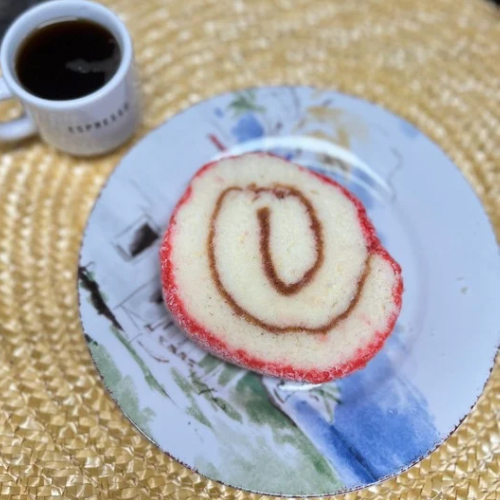 Jelly Roll with Strawberry filling and coconut shredding around